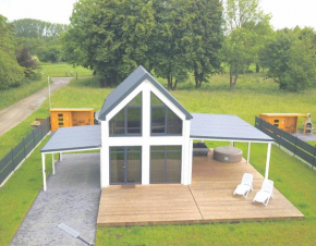 Ferienhaus Mila 70qm bis 5 Gäste mit Sauna, Whirlpool in der Hauptsaison, 75qm Terrasse und eingezäunten Garten Haustiere willkommen